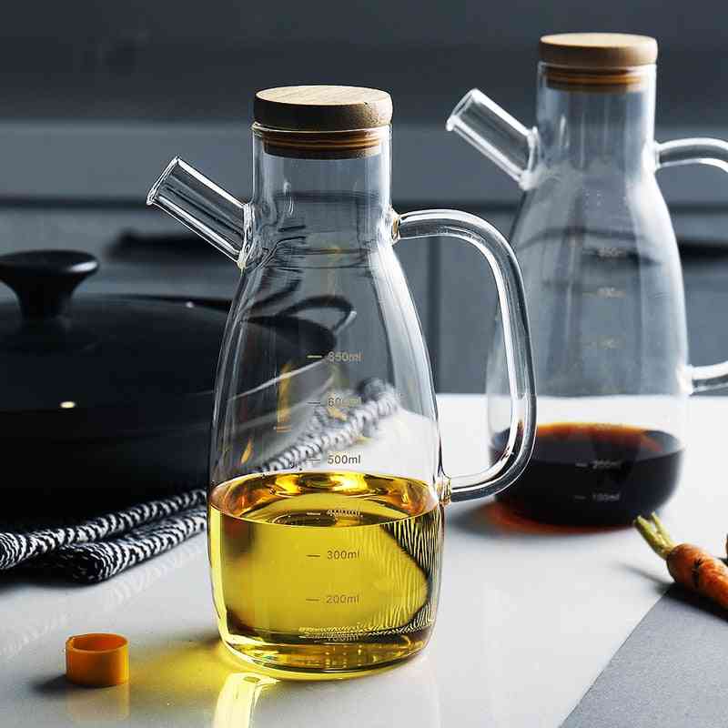 Transparent värmebeständig oljeflaska i lecythusglas med handtag - köksoja, vinäger, såsbehållare