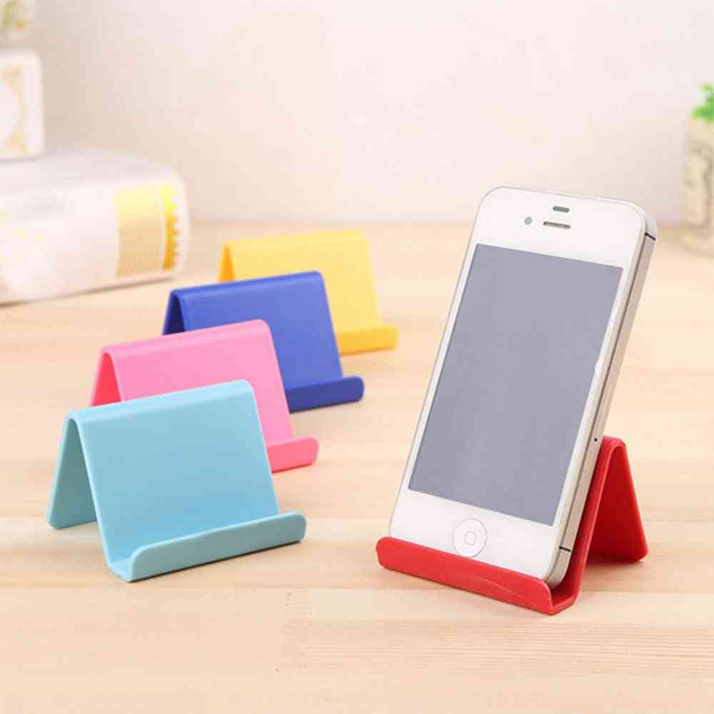 Mini, Portable And Fixed Stand For Mobile Phone And Remote Control