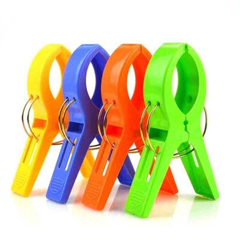 Grote felle kleur kleding clip plastic strandlaken haringen wasknijper clips aan zonnebank multicolor