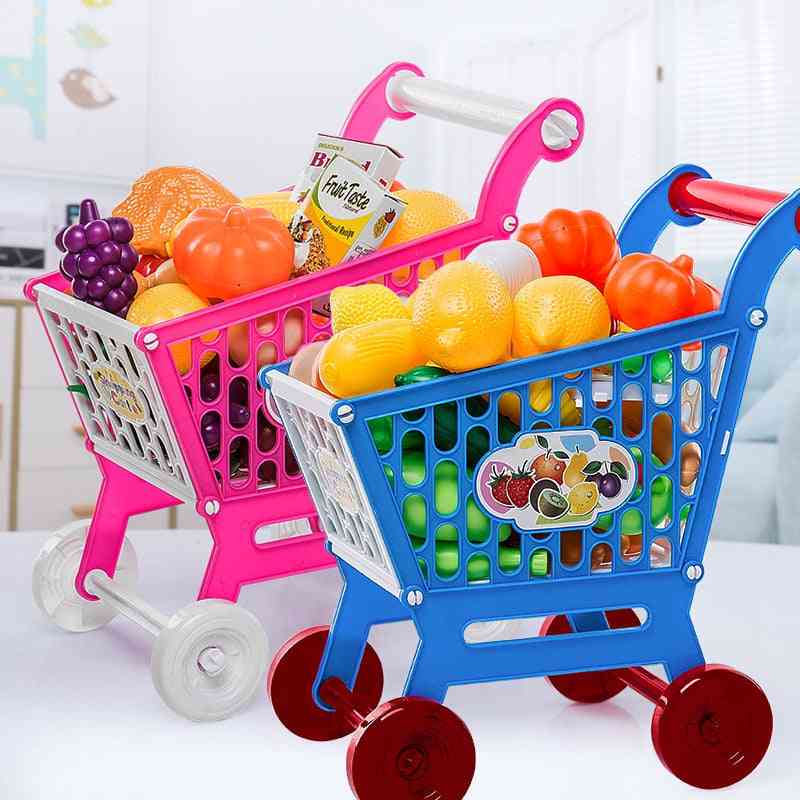 Lasten roolileikki supermarketin lelu ostoskorivaunu, jossa hedelmiä ja vihanneksia - teeskennellä leikkileluja