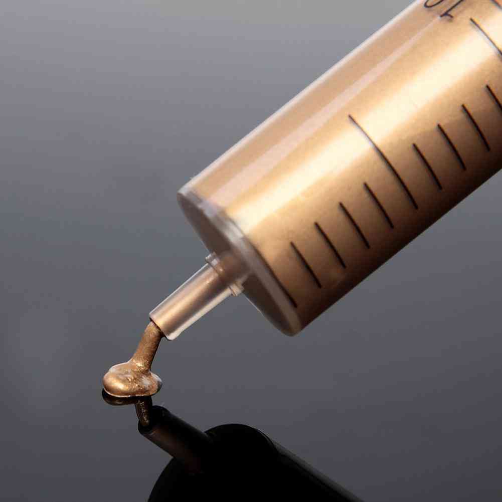 Zlatna štrcaljka za termalnu mast od silikona
