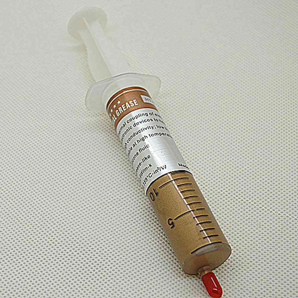 Gold Thermal Grease Syringe From Silicone