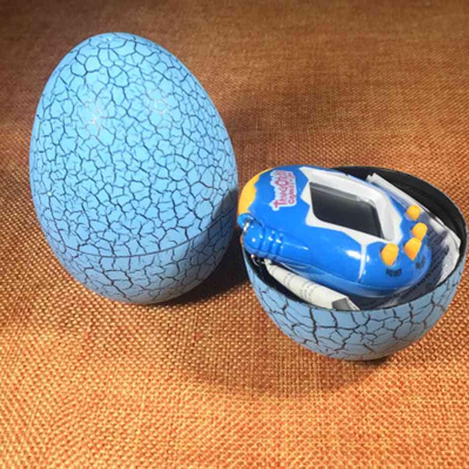 Huevo de dinosaurio juguete tamagotchi