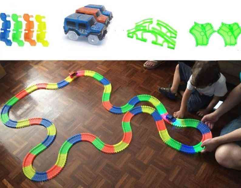 Binario flessibile luminoso magico ferroviario, giocattoli per auto per bambini