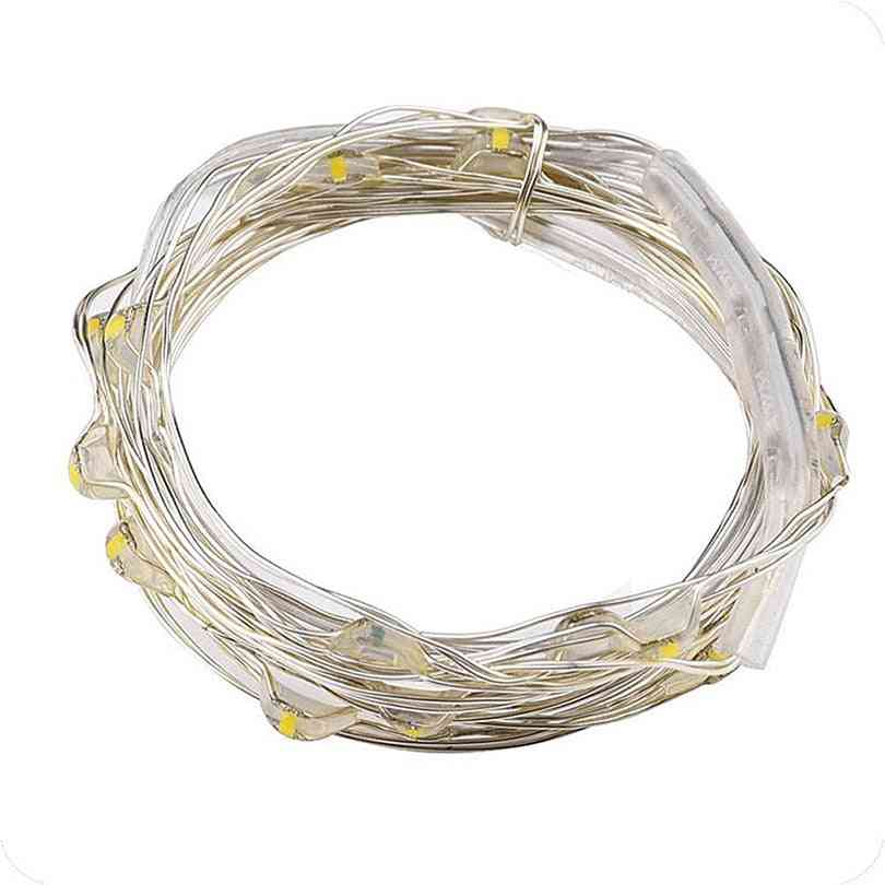 Medené drôty vedené strunovými svetlami - sviatočná girlanda na zdobenie