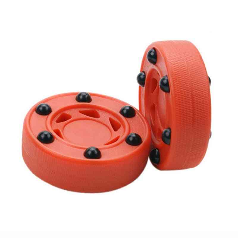 Rondelle haute densité ABS de hockey à roulettes durable parfaitement équilibrée pour l'entraînement de roller hockey de rue