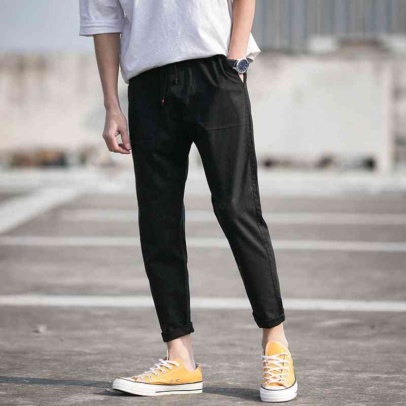 Jesienne nowe męskie bawełniane spodnie dresowe, solidne spodnie do fitnessu - m / czarny