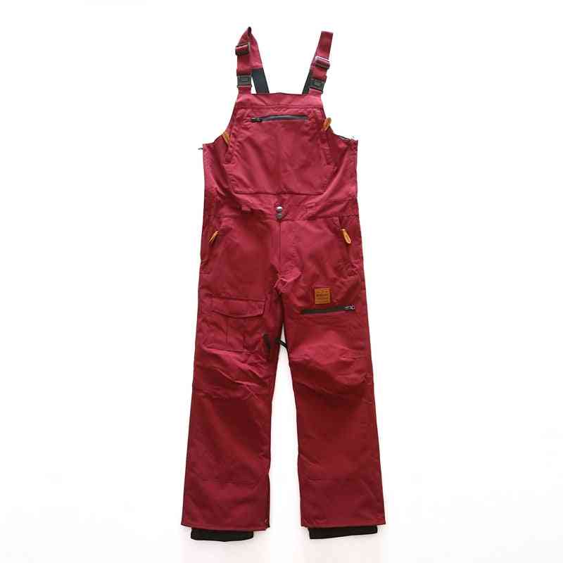 Narciarskie snowboardowe wodoodporne spodnie na szelkach śniegowe ciepłe męskie ubrania robocze w stylu vintage