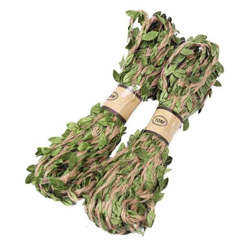 конопено въже зелени листа ловна обвивка с пушка, камуфлаж от канап