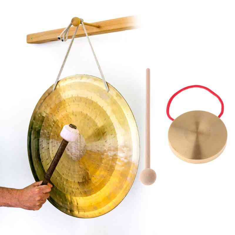 Címbalos de gongo de cobre com vara de madeira