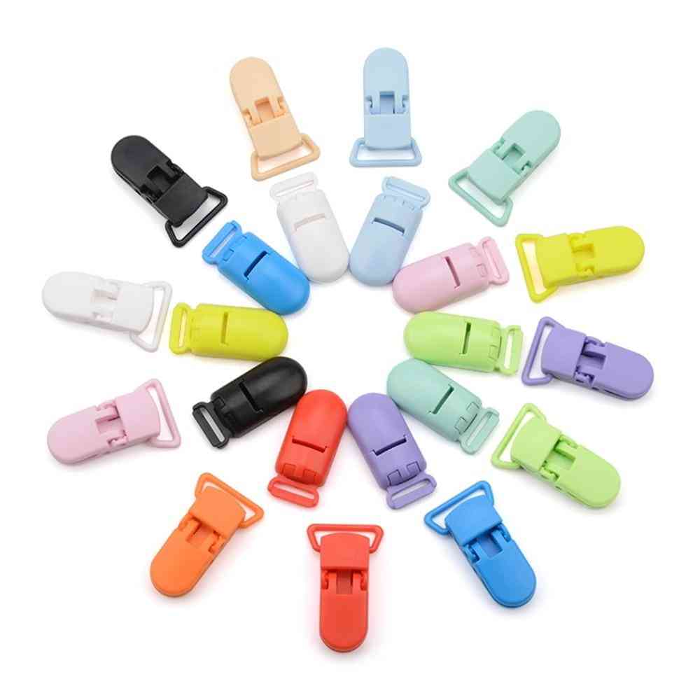 Schnullerclips für Babys, Schnuller aus massivem Kunststoff, Brustwarzenhalter, mehrfarbiges Klemmspielzeug