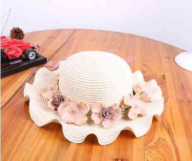 Cappelli di paglia sunbonnet estivi con fiori