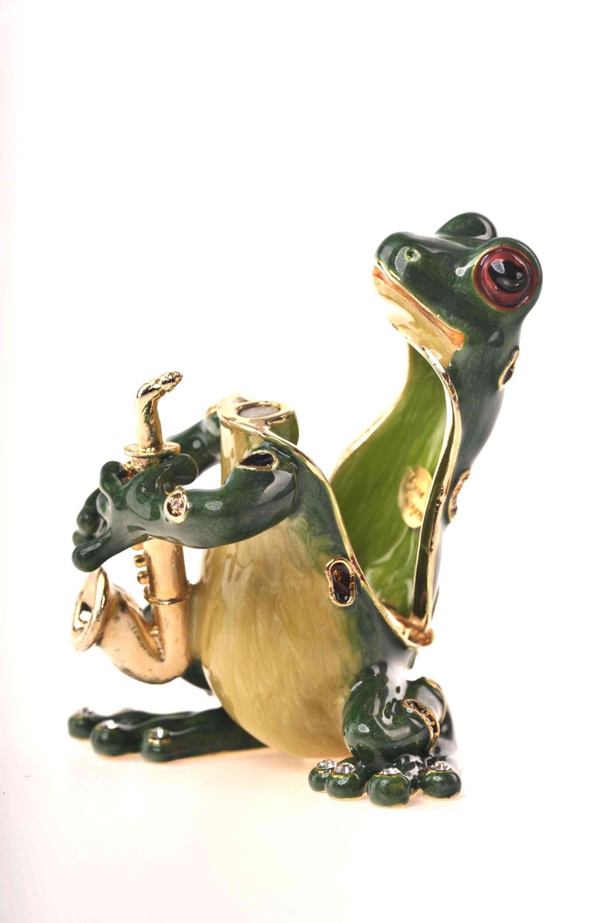 žaba hrajúca na saxofón - držiak na šperky