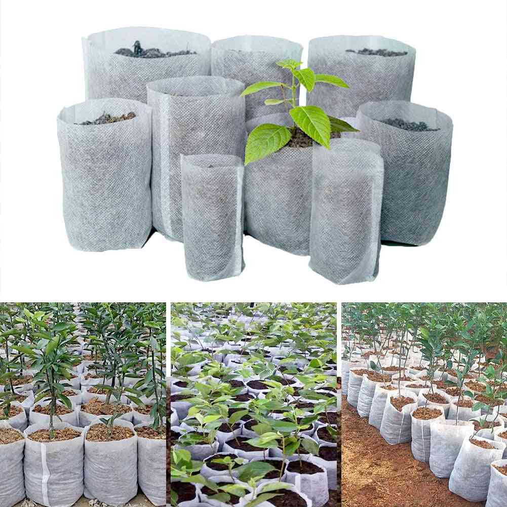 100 kpl erikokoisia biohajoavia kuitukangaisia taimiruukkupusseja