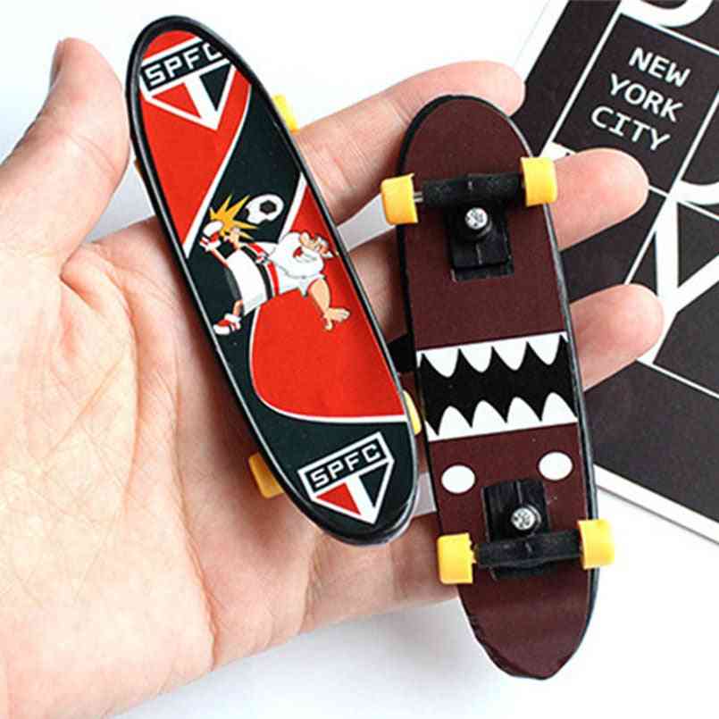 Mini skate de plástico de dedo de skate, mordaça de novidade para,