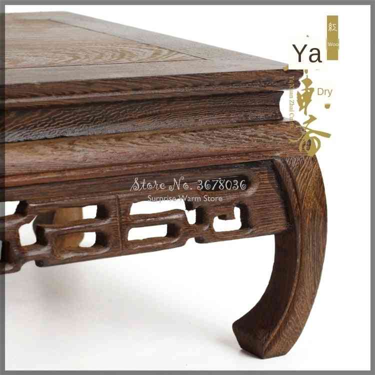Tavolo da tè in legno massello con base decorativa