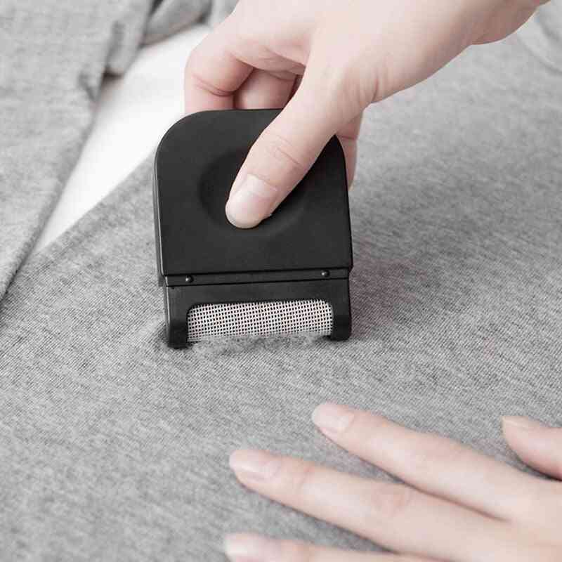 Tessuto portatile per rimuovere pelucchi di vestiti elettrici