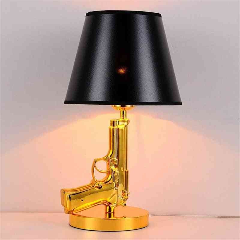Moderne guldpistol lyser luksuriøs bordlampe