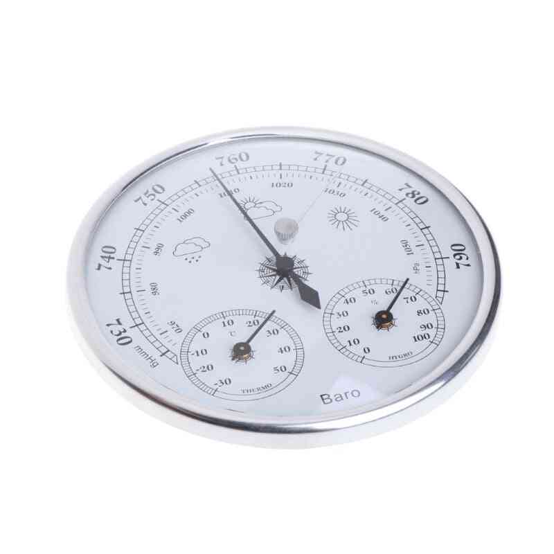 Perinteinen kellopainemittari lämpömittarilla ja kosteusmittarilla