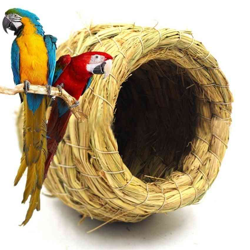 Handgjorda halm naturliga fågelhus papegoja boet varm