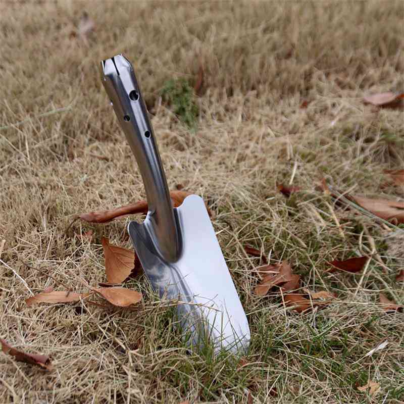 Ruostumaton teräs puutarhalastalla ruukkumulta kauha käsilapio työkalu maankaivurit