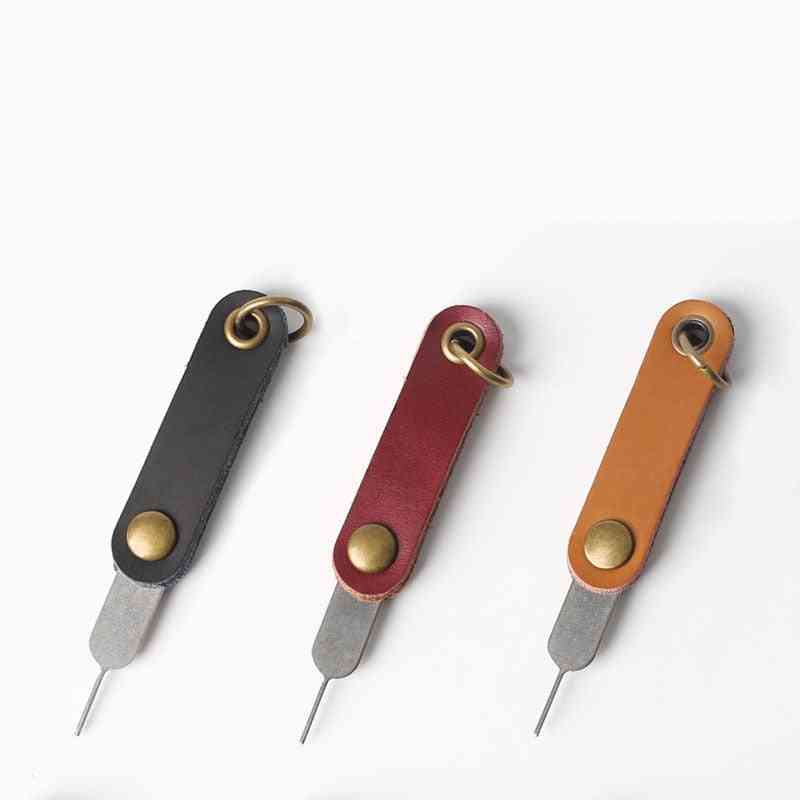 Bärbart universellt roterande kort nyckelverktyg med öppen nål